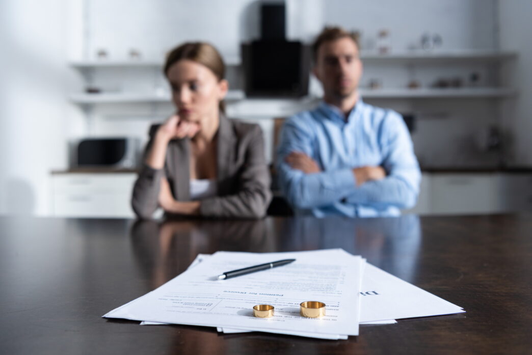 how long does an uncontested divorce take? | couple sitting with divorce papers